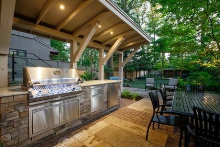 Outdoor covered BBQ with sitting area Old World Charm