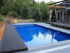 60425ce7453bce632ec70ea9 Raised composite boardwalk and modern pool