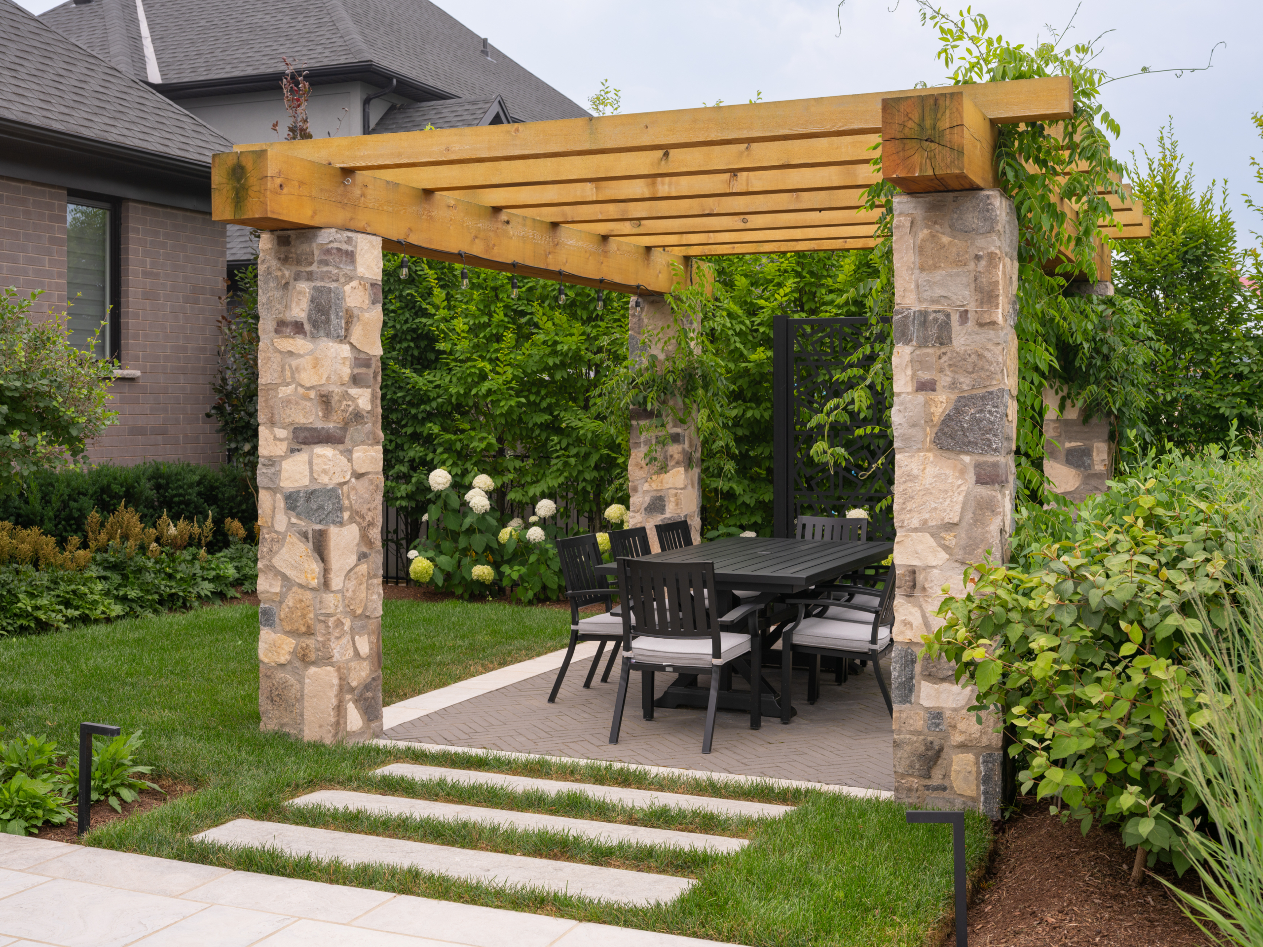 Earthscape Landscapes - Outdoor Haven Property Stone and Wood Pergola